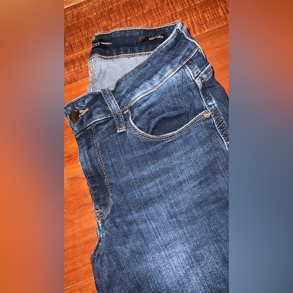 Guess denim jeans. Size 26. Sexy Curve mid rise skinny jeans.